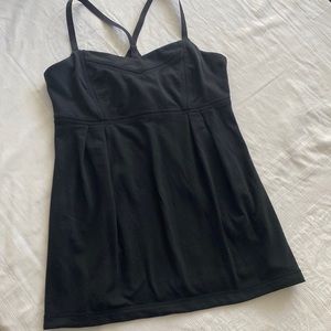 Lululemon empire waist workout top. Black with unpadded shelf bra. Size 8